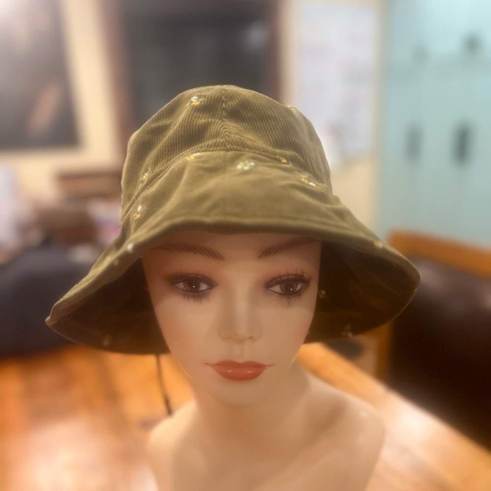 Green corduroy hat with flower design in GUC